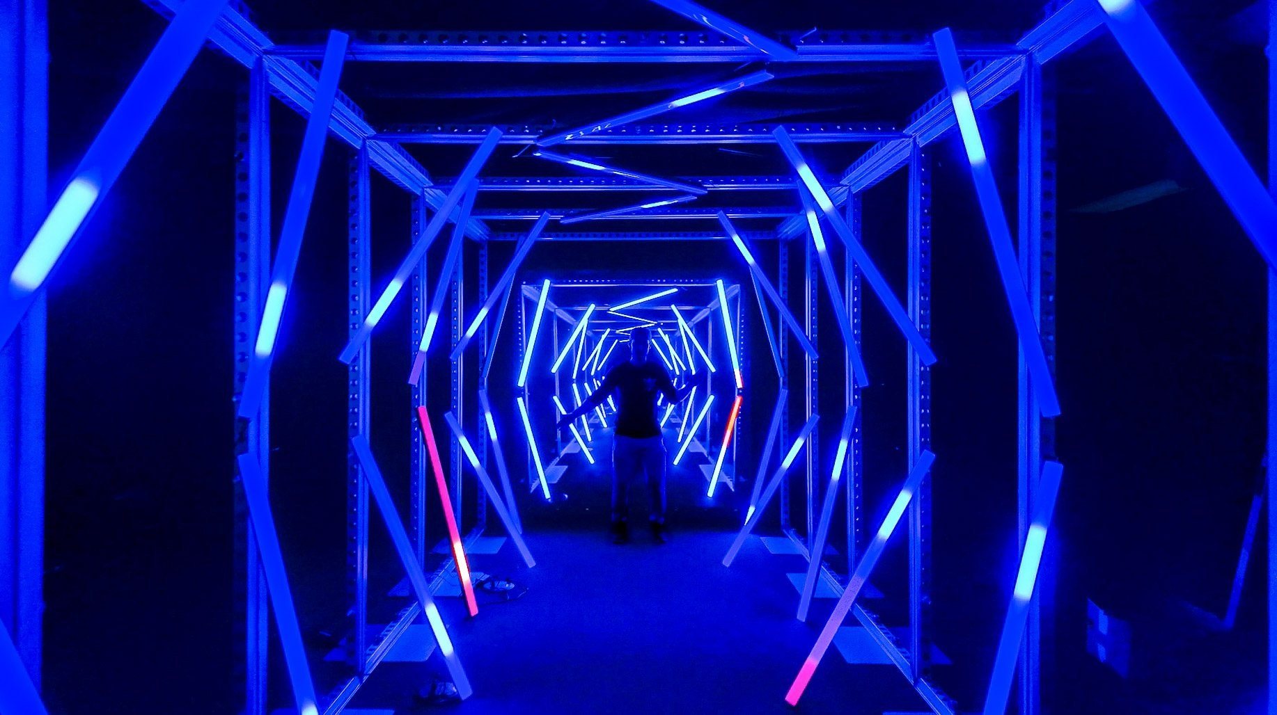 Blue LED tunnel stretching into the dark