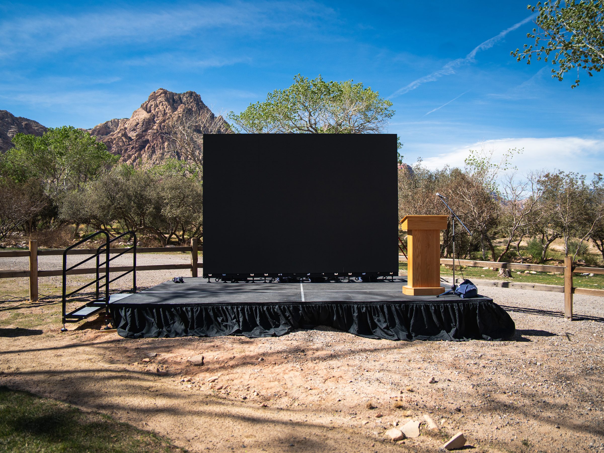 Stage and LED screen set up in the canyon before guests arrive