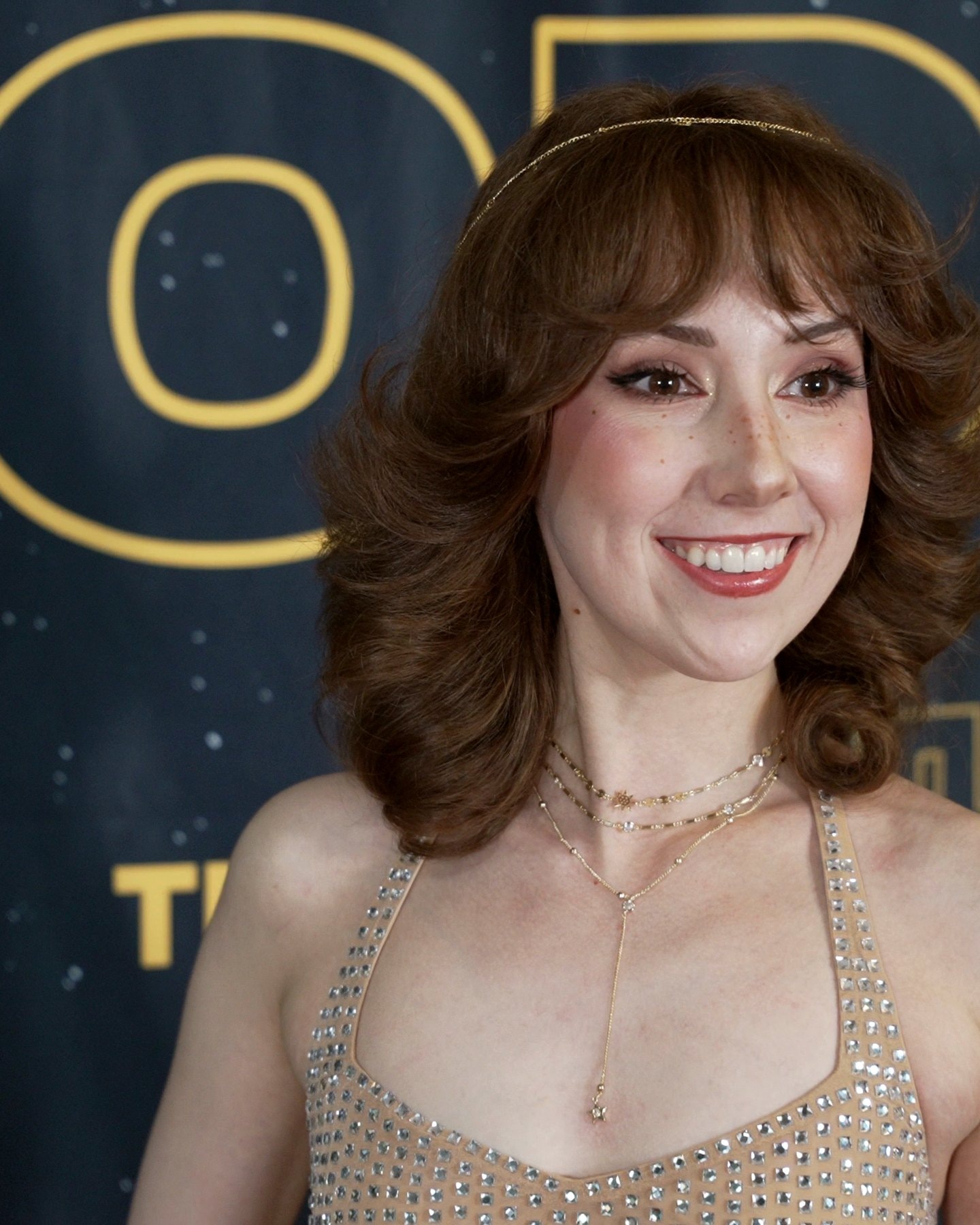 Hilly Hindi smiling at the "May the Parody Be With You" step and repeat
