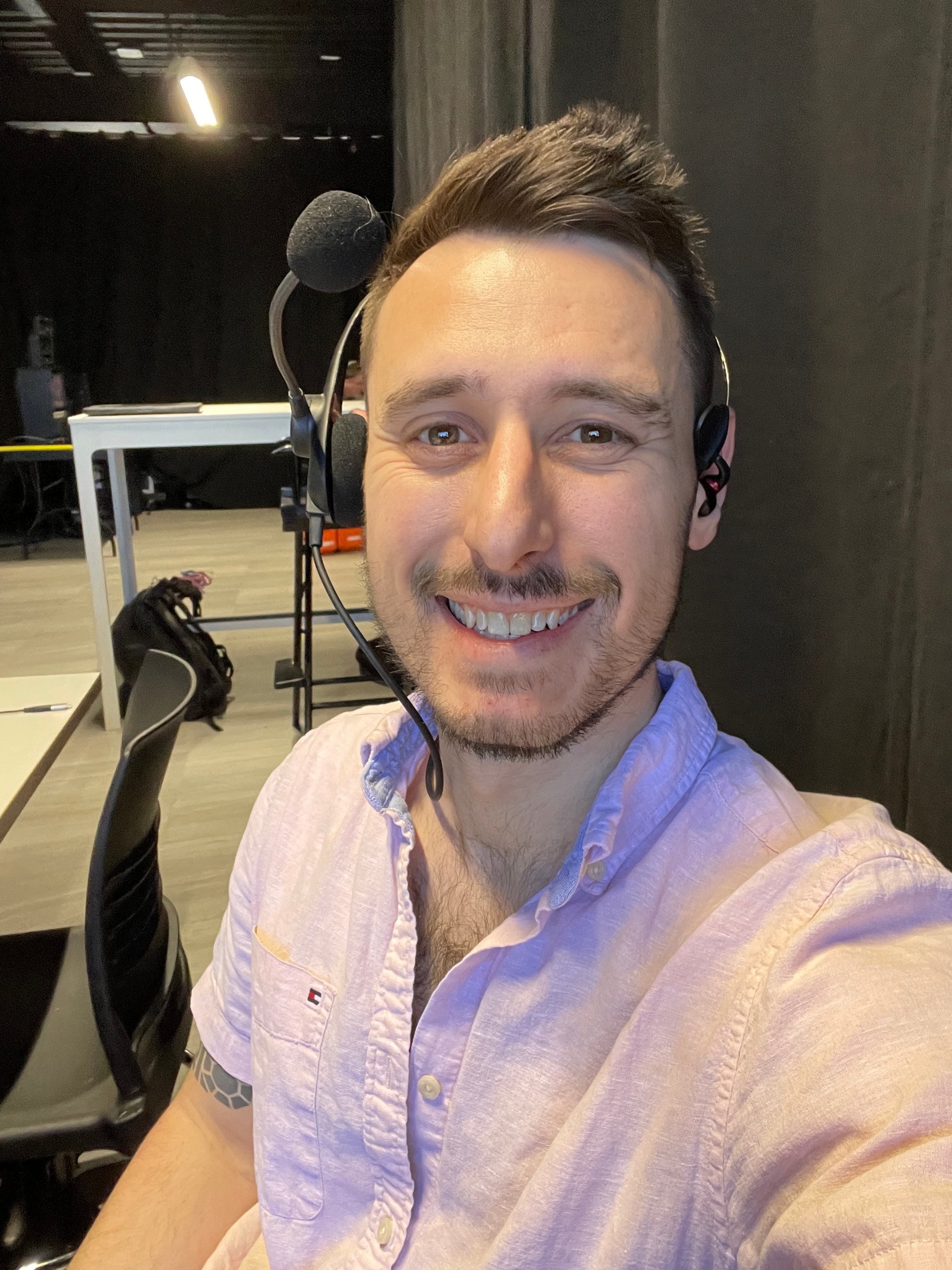 Garrett on a comms headset in the SFL control room