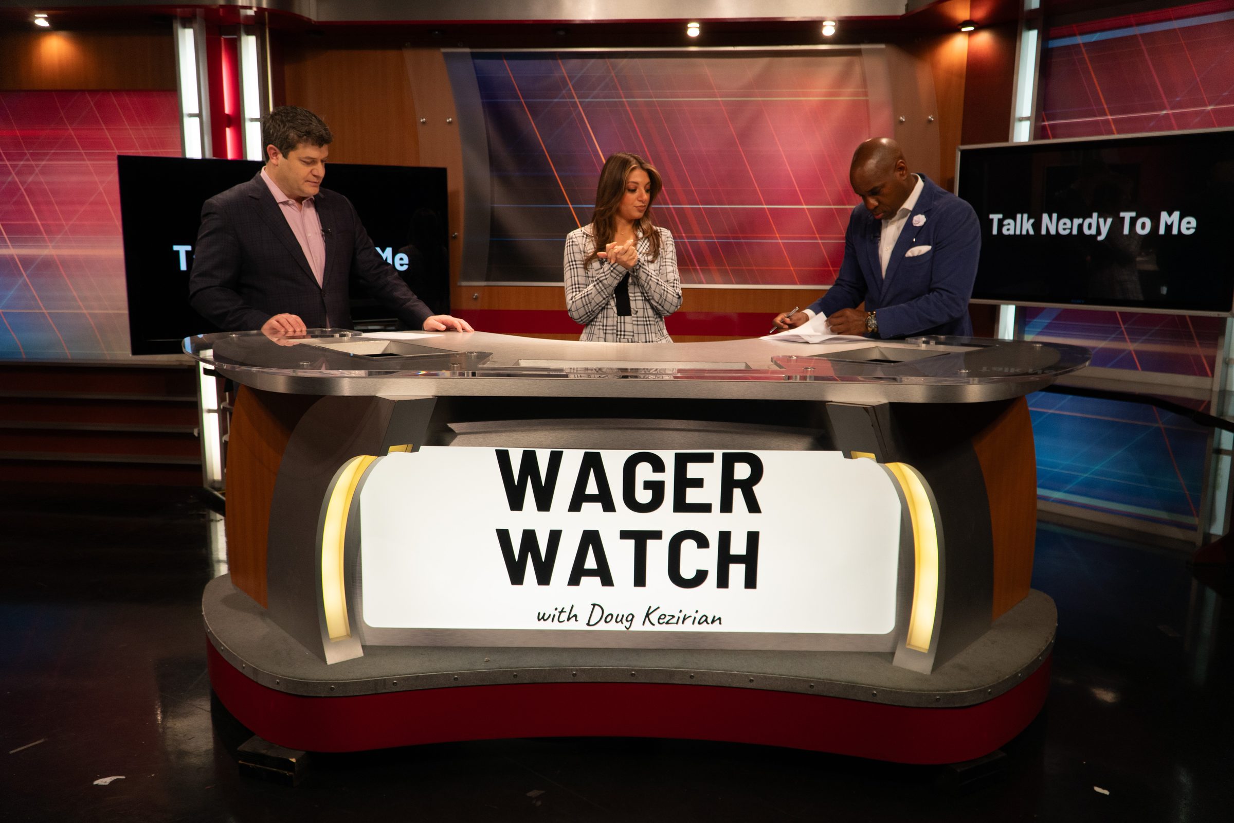 Wager Watch hosts at the desk on set